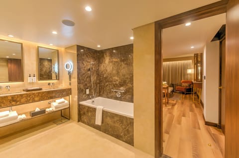 Presidential Suite | Bathroom | Rainfall showerhead, hair dryer, bathrobes, slippers