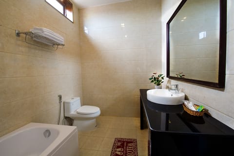 Deluxe Double Room, 1 King Bed, Terrace | Bathroom | Combined shower/tub, free toiletries, slippers, towels