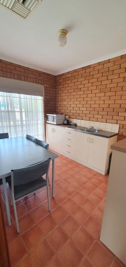 Family Room, 3 Bedrooms | Private kitchen | Fridge, microwave, coffee/tea maker, electric kettle