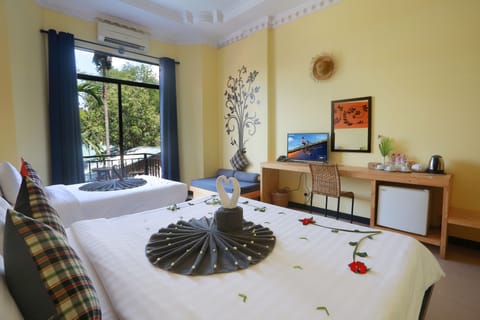 Deluxe Family With Balcony (Free Pick Up) | Minibar, in-room safe, individually decorated, individually furnished