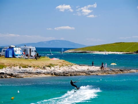 On the beach, snorkeling, windsurfing, kayaking