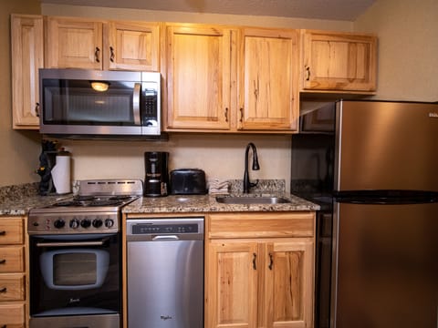 Villager Condo | Private kitchen | Fridge, microwave, coffee/tea maker