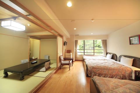 Japanese Western Style Room with Japanese Futon, Mountain View | Living area | Flat-screen TV