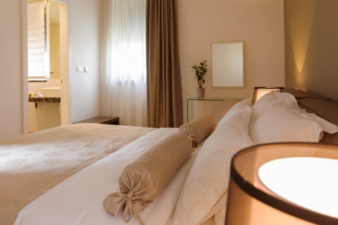 Luxury Two Bedroom Suite | Premium bedding, in-room safe, desk, soundproofing