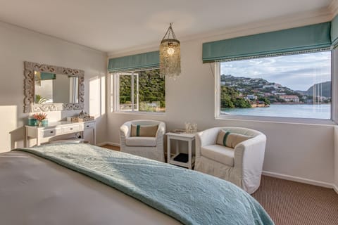 Standard Suite, 1 Bedroom, Lagoon View | Egyptian cotton sheets, premium bedding, down comforters, minibar