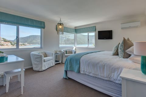 Standard Suite, 1 Bedroom, Lagoon View | Egyptian cotton sheets, premium bedding, down comforters, minibar