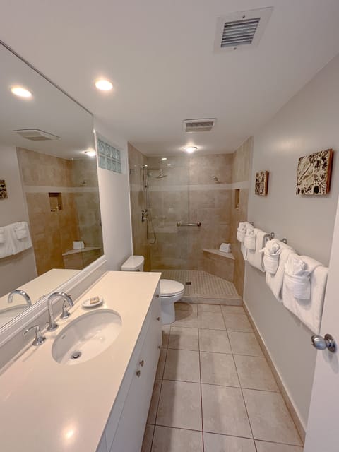 Deluxe Suite, 2 Bedrooms, Beachfront | Bathroom | Shower, free toiletries, hair dryer, towels