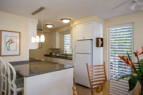 Deluxe Suite, 1 Bedroom, Partial Ocean View | Private kitchen | Fridge, microwave, coffee/tea maker, toaster