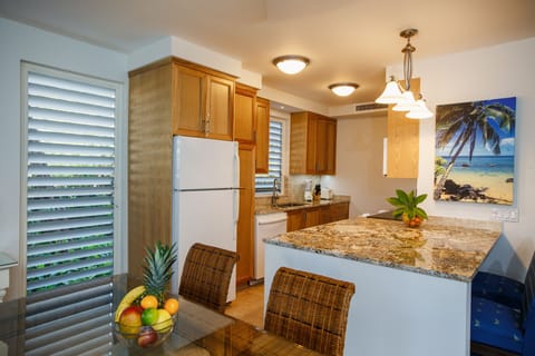 Deluxe Suite, 1 Bedroom, Partial Ocean View | Private kitchen | Fridge, microwave, coffee/tea maker, toaster