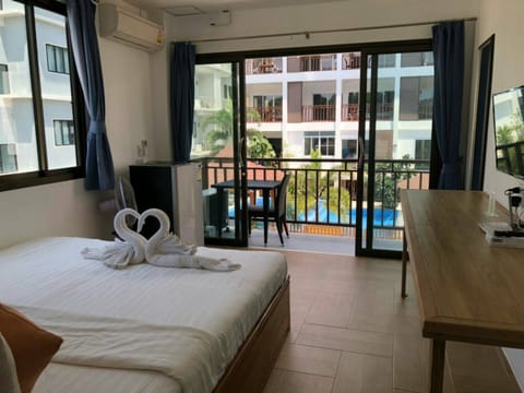 Economy Double Room | 1 bedroom, down comforters, blackout drapes, free WiFi