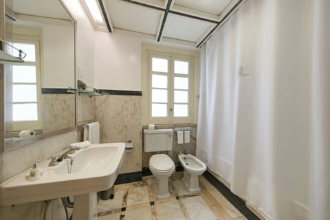 Combined shower/tub, free toiletries, hair dryer, bathrobes