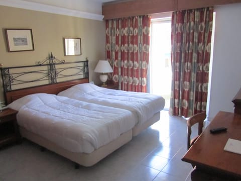 Twin Room, Pool View | In-room safe, desk, blackout drapes, iron/ironing board