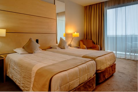 Standard Double or Twin Room | Free minibar items, in-room safe, desk, blackout drapes