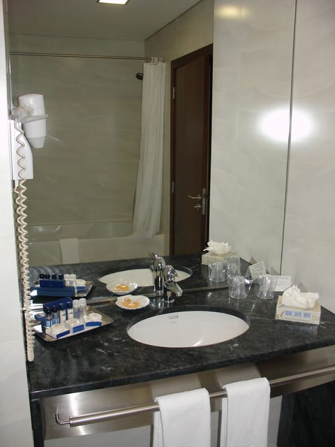 Triple Room | Bathroom | Bathtub, deep soaking tub, rainfall showerhead, free toiletries