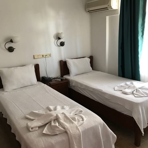 Economy Twin Room, 1 Bedroom, Smoking | Premium bedding, free WiFi