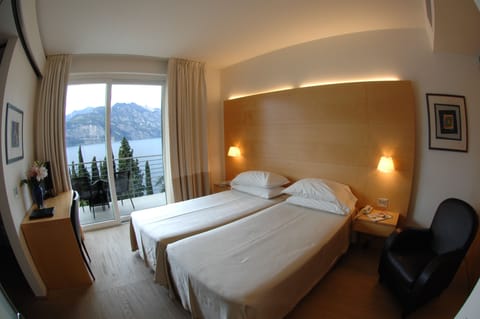 Junior Suite, Balcony, Lake View | Frette Italian sheets, minibar, in-room safe, desk