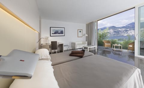 Junior Suite Superior with Balcony/Terrace and Lake View | Frette Italian sheets, minibar, in-room safe, desk