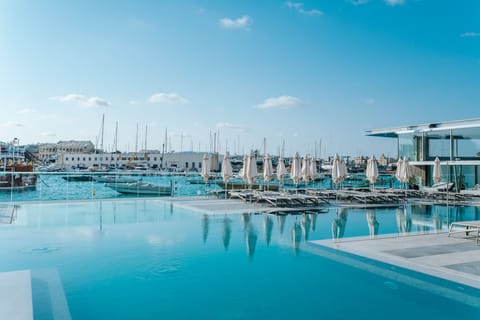 Indoor pool, seasonal outdoor pool, pool umbrellas, sun loungers