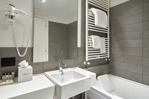 Suite | Bathroom | Designer toiletries, hair dryer, slippers, bidet