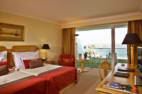 Deluxe Double or Twin Room, Balcony, Partial Ocean View | Free minibar, in-room safe, desk, laptop workspace