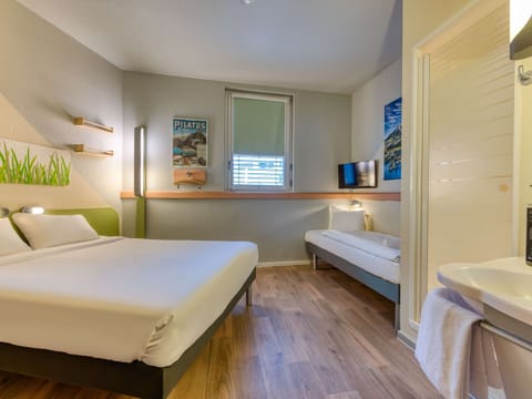 Family Twin Room, Multiple Beds | Bathroom | Shower, eco-friendly toiletries, hair dryer, towels