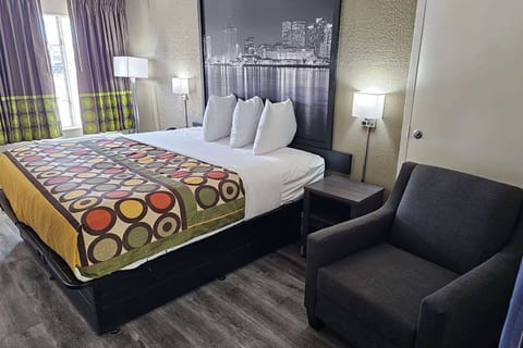 Deluxe Room, 1 King Bed, Smoking | In-room safe, desk, laptop workspace, iron/ironing board