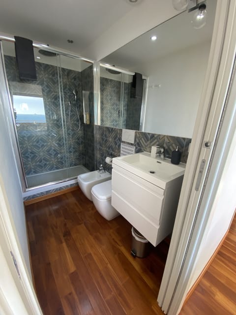 Superior Suite, Sea Facing | Bathroom | Shower, rainfall showerhead, designer toiletries, hair dryer