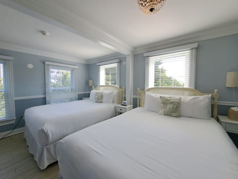 Deluxe Room, 2 Queen Beds, Terrace | Minibar, in-room safe, iron/ironing board, free WiFi