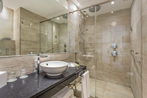 Deep soaking tub, eco-friendly toiletries, hair dryer, bidet