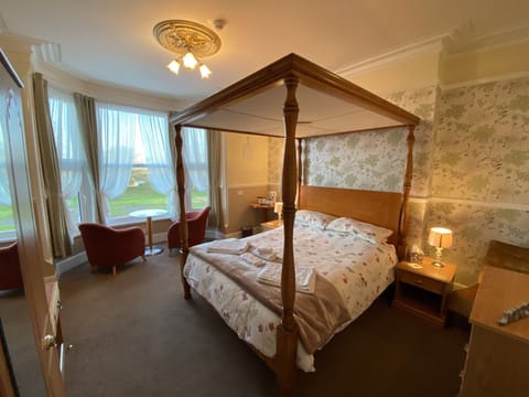 Standard Room, 1 King Bed, Sea View (Four Poster Adults Only) | Iron/ironing board, free WiFi, bed sheets