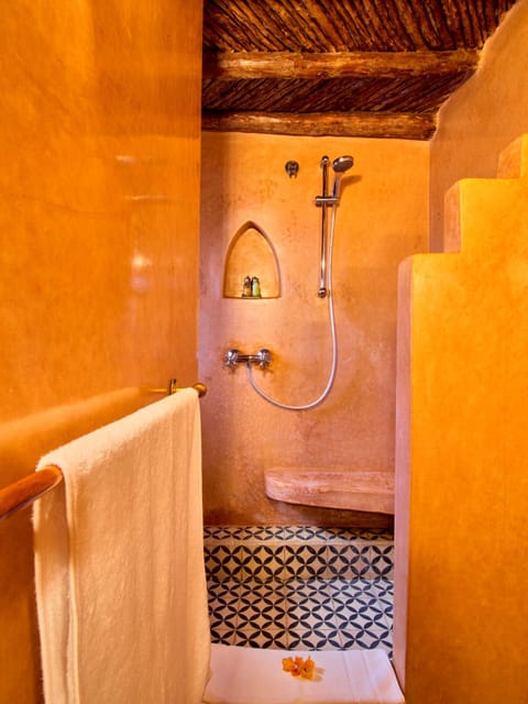 Family Suite | Bathroom | Shower, designer toiletries, hair dryer, bathrobes