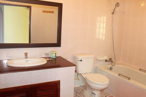 Family Room | Bathroom | Rainfall showerhead, free toiletries, hair dryer, slippers