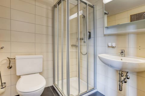 Shower, free toiletries, hair dryer, towels