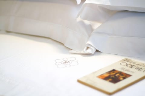 Premium bedding, in-room safe, individually decorated, desk