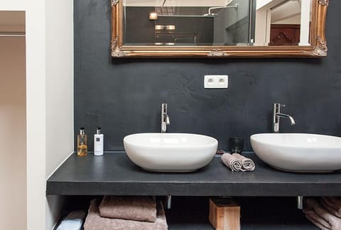 Suite | Bathroom | Shower, designer toiletries, hair dryer, slippers