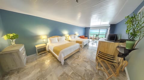 Standard Triple Room, Sea View | Premium bedding, down comforters, minibar, in-room safe