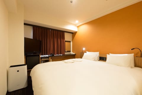 Standard Double Room | Down comforters, desk, blackout drapes, free WiFi