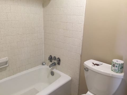 Standard Room, 1 Queen Bed, Smoking | Bathroom | Bathtub, hair dryer, towels