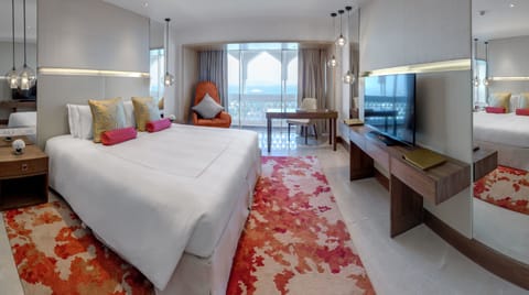Deluxe Room Sea View | Premium bedding, minibar, in-room safe, individually decorated
