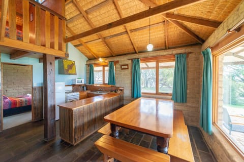 Mudbrick Cottage | Private kitchen | Full-size fridge, microwave, oven, stovetop