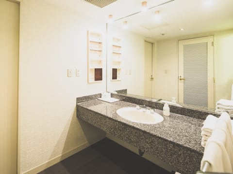 Superior Family Group Room | Bathroom | Combined shower/tub, deep soaking tub, free toiletries, hair dryer