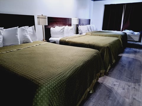 Basic Triple Room | Premium bedding, pillowtop beds, desk, iron/ironing board