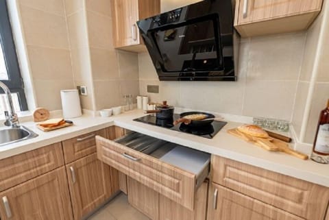 2 Bedroom Standard A | Private kitchen | Fridge, microwave, stovetop, coffee/tea maker