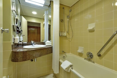 Separate tub and shower, deep soaking tub, free toiletries, hair dryer