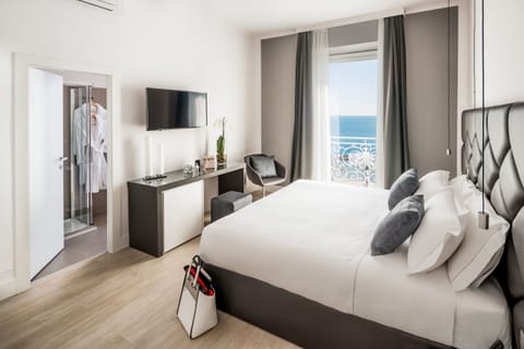 Junior Suite, Balcony, Sea View | Premium bedding, pillowtop beds, minibar, in-room safe