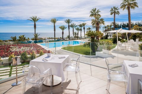 Lunch, dinner served; Italian cuisine, pool views 