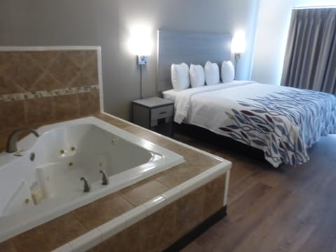 Superior Room, 1 King Bed, Non Smoking, Jetted Tub | Blackout drapes, free WiFi, bed sheets