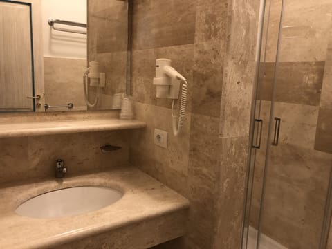 Deep soaking tub, rainfall showerhead, free toiletries, hair dryer