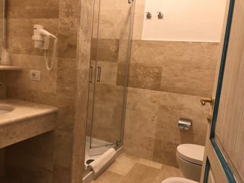 Deep soaking tub, rainfall showerhead, free toiletries, hair dryer