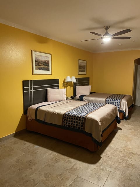 Deluxe Room, 2 Queen Beds, Pool View | Desk, blackout drapes, iron/ironing board, free WiFi